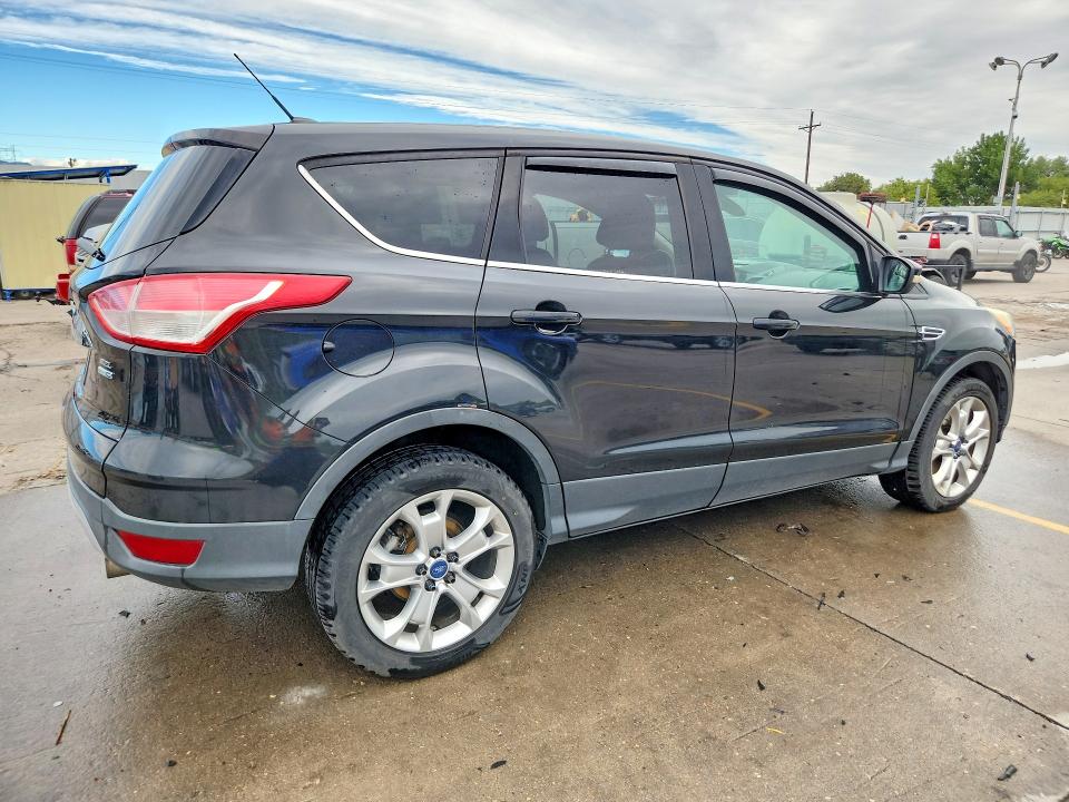 Photo 3 from auction – 2013 FORD ESCAPE with VIN 1FMCU9HX3DUB27892