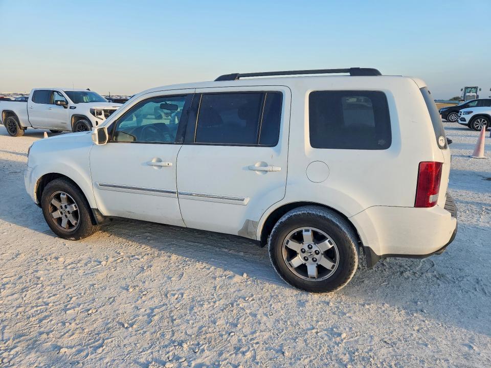 Photo 2 from auction – 2010 HONDA PILOT with VIN 5FNYF3H90AB019706