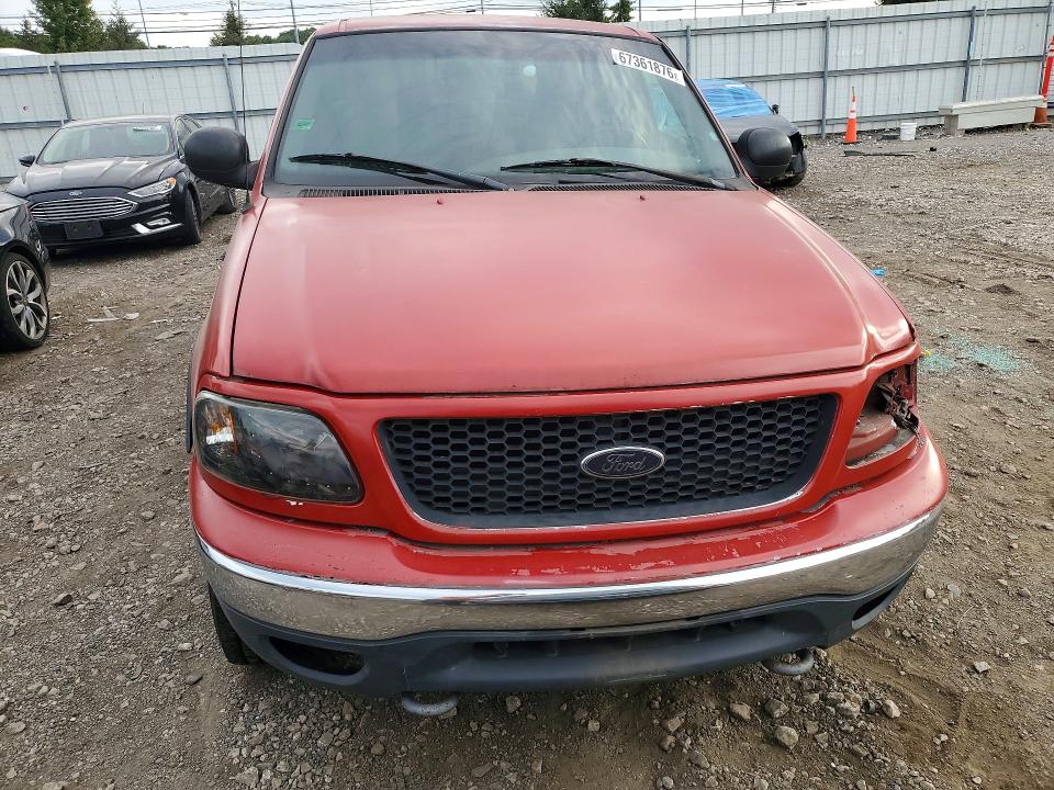 Photo 5 from auction – 1999 FORD F150 with VIN 1FTRF18W5XNB46007