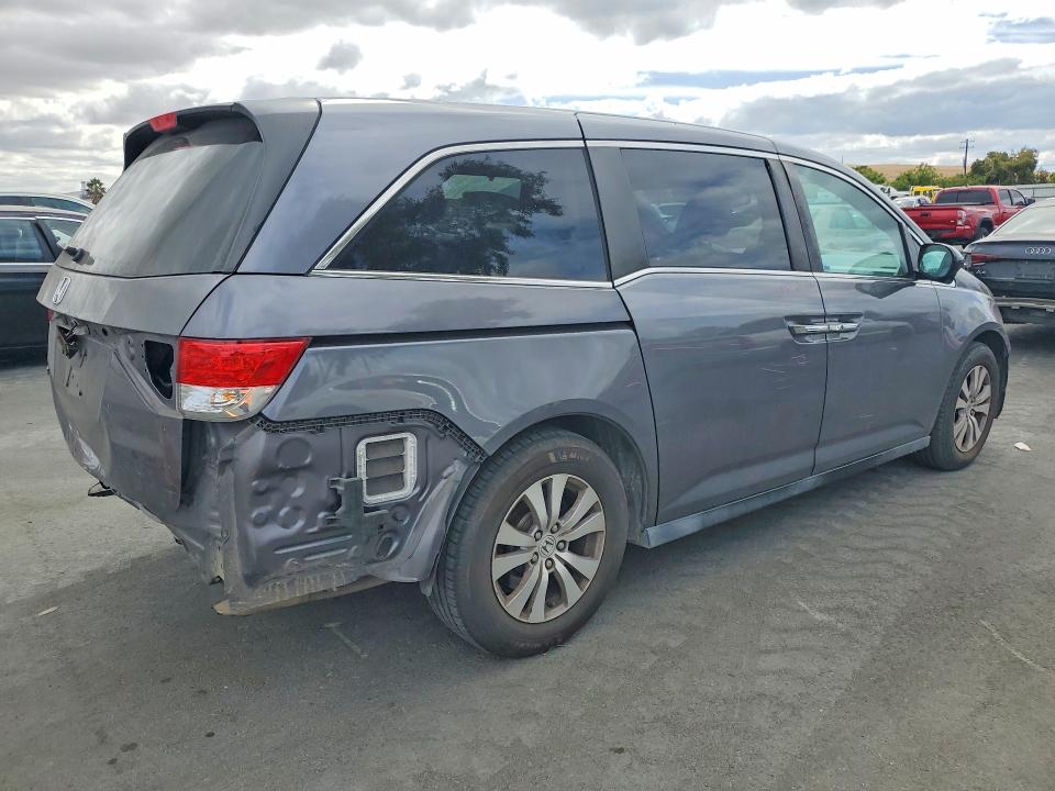 Photo 3 from auction – 2016 HONDA ODYSSEY with VIN 5FNRL5H60GB021544