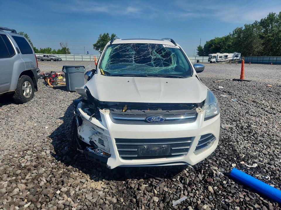 Снимка 5 от търг – 2016 FORD ESCAPE с VIN 1FMCU9GX0GUA56267