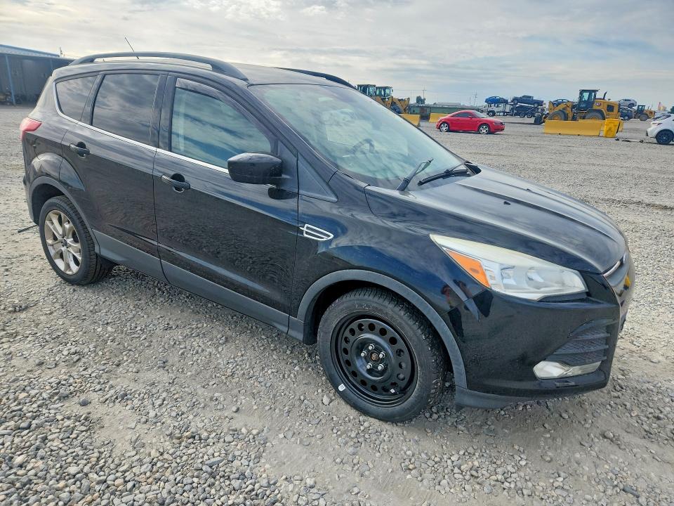 Photo 4 from auction – 2016 FORD ESCAPE with VIN 1FMCU0GX1GUB14382