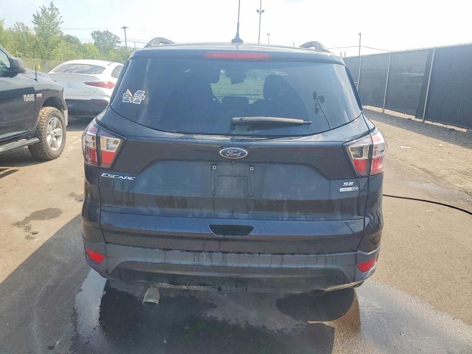 Photo 6 from auction – 2018 FORD ESCAPE with VIN 1FMCU9GD8JUD49072