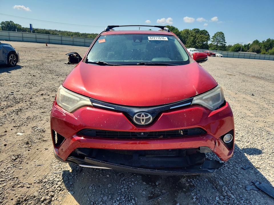 Photo 5 from auction – 2016 TOYOTA RAV4 with VIN JTMYFREVXGJ067722