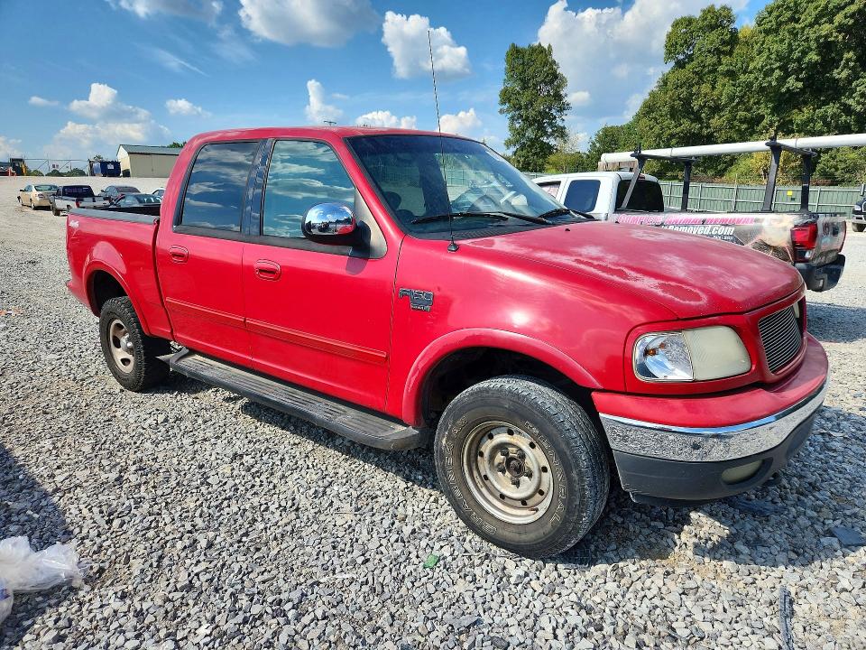 Photo 4 from auction – 2001 FORD F150 with VIN 1FTRW08L11KF51564