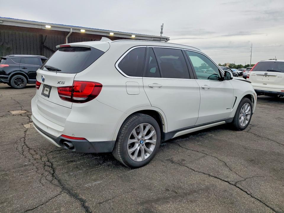 Фото 3 с аукциона – 2014 BMW X5 с VIN 5UXKR0C55E0H20649
