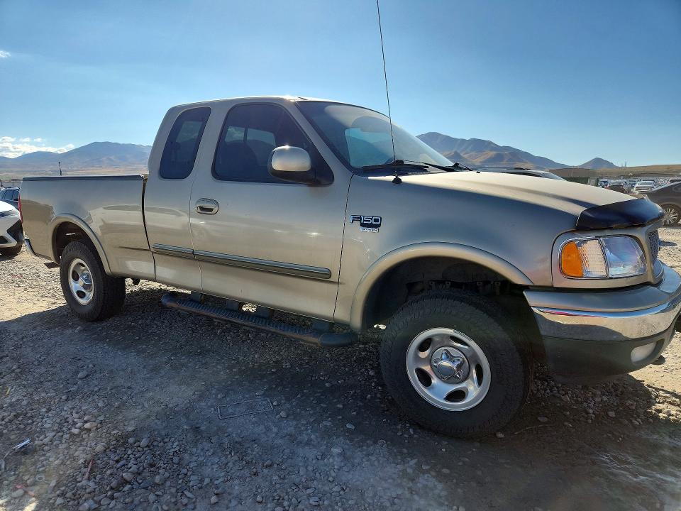 Photo 4 from auction – 2000 FORD F150 with VIN 1FTRX18L5YKA29131
