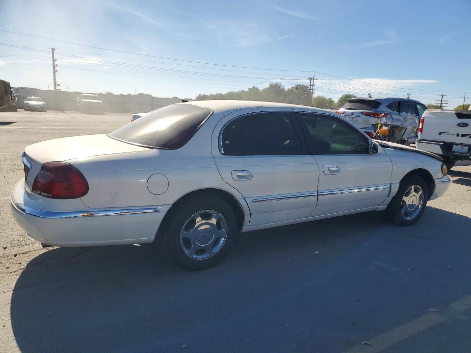 Photo 3 from auction – 2001 LINCOLN CONTINENTAL with VIN 1LNHM97V51Y633699