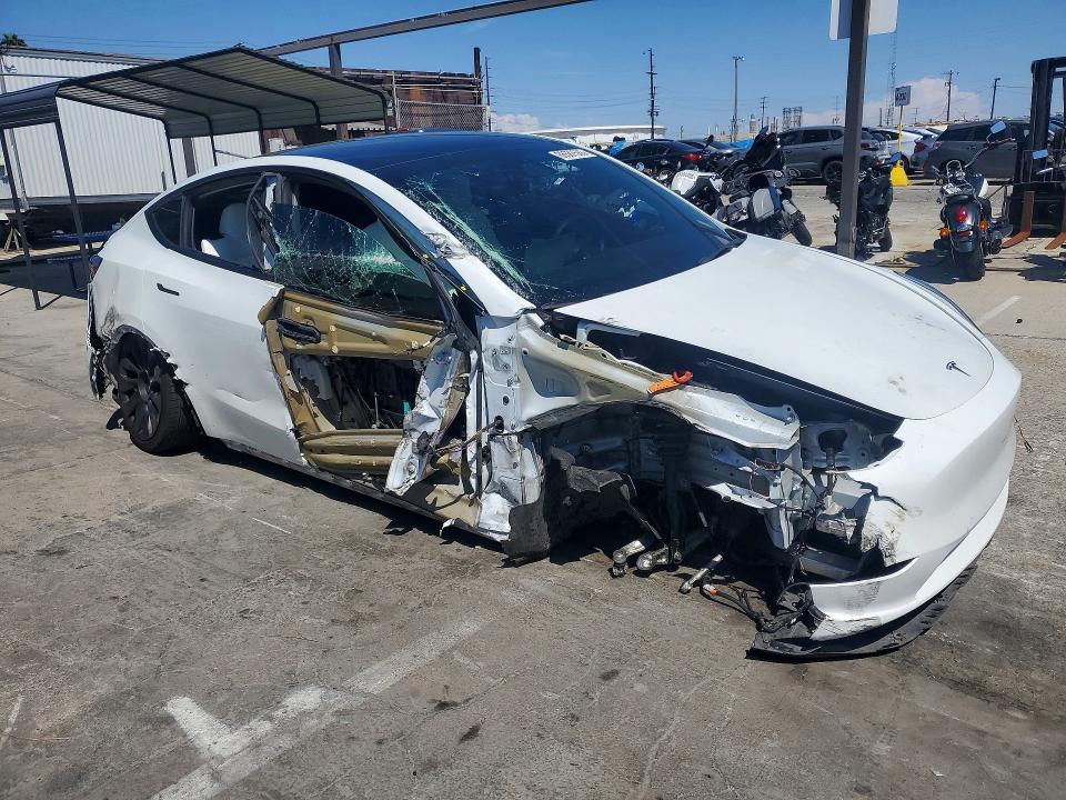 Photo 4 from auction – 2022 TESLA MODEL Y with VIN 7SAYGDEF8NF407014