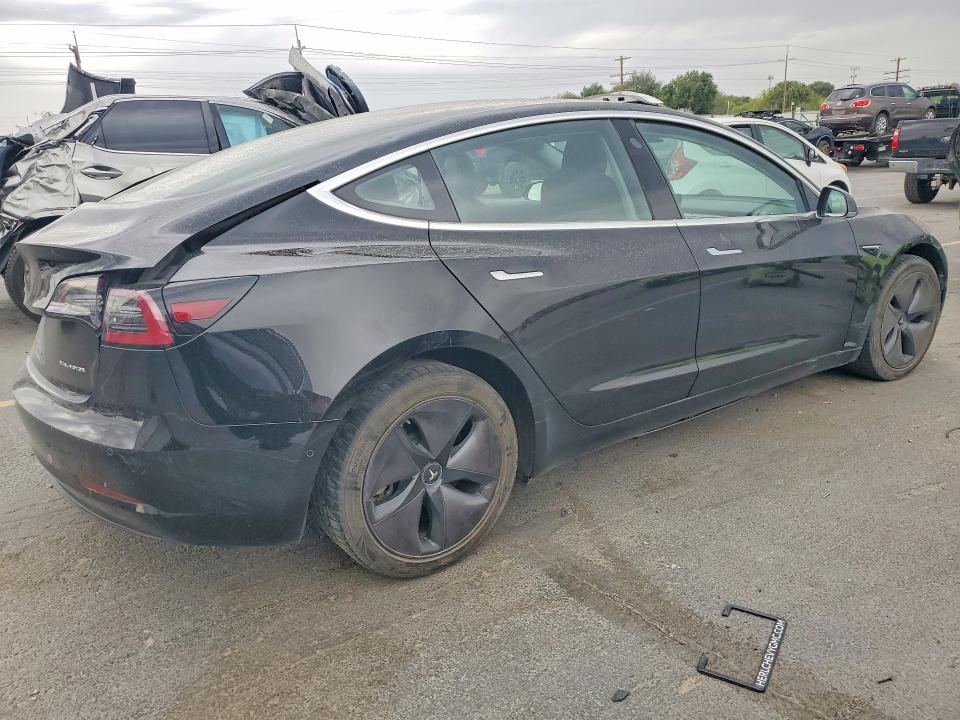 Снимка 3 от търг – 2018 TESLA MODEL 3 с VIN 5YJ3E1EB7JF118709