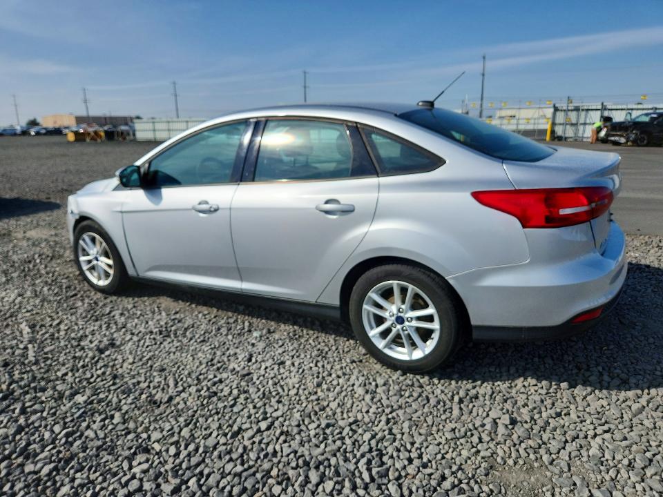 Снимка 2 от търг – 2016 FORD FOCUS с VIN 1FADP3F20GL322188