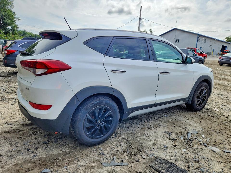 Photo 3 from auction – 2017 HYUNDAI TUCSON with VIN KM8J3CA43HU394690