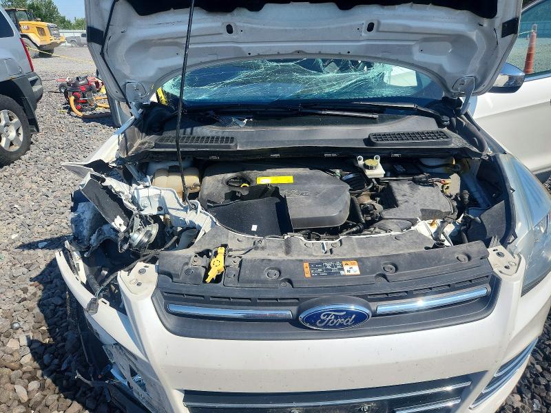Снимка 11 от търг – 2016 FORD ESCAPE с VIN 1FMCU9GX0GUA56267