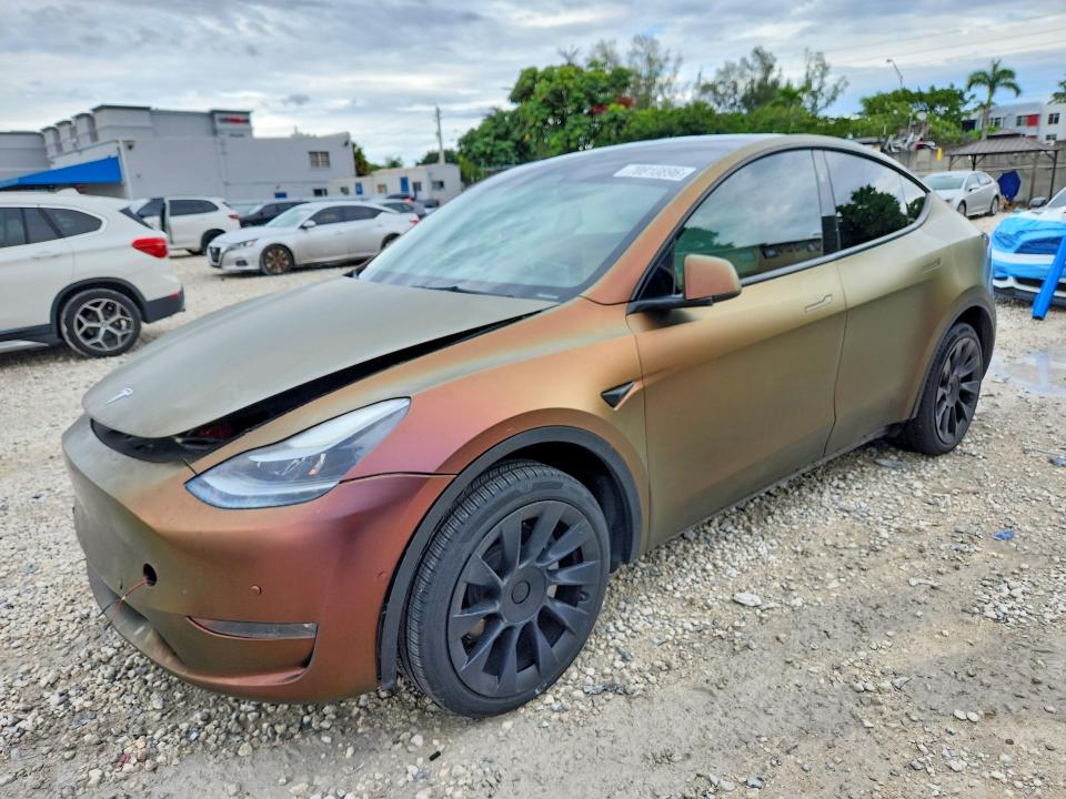 Снимка 1 от търг – 2023 TESLA MODEL Y с VIN 7SAYGDEE1PF885169