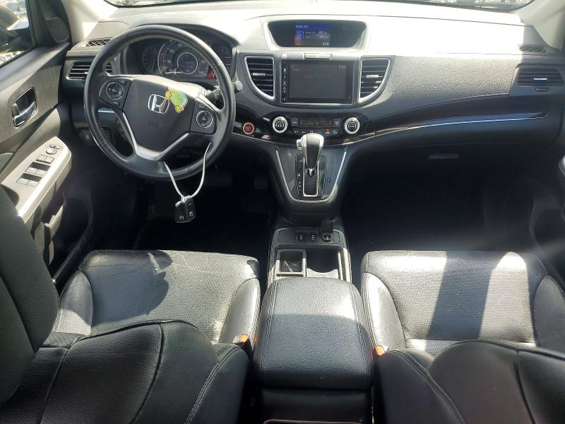 Photo 8 from auction – 2015 HONDA CR-V with VIN 2HKRM4H71FH601272
