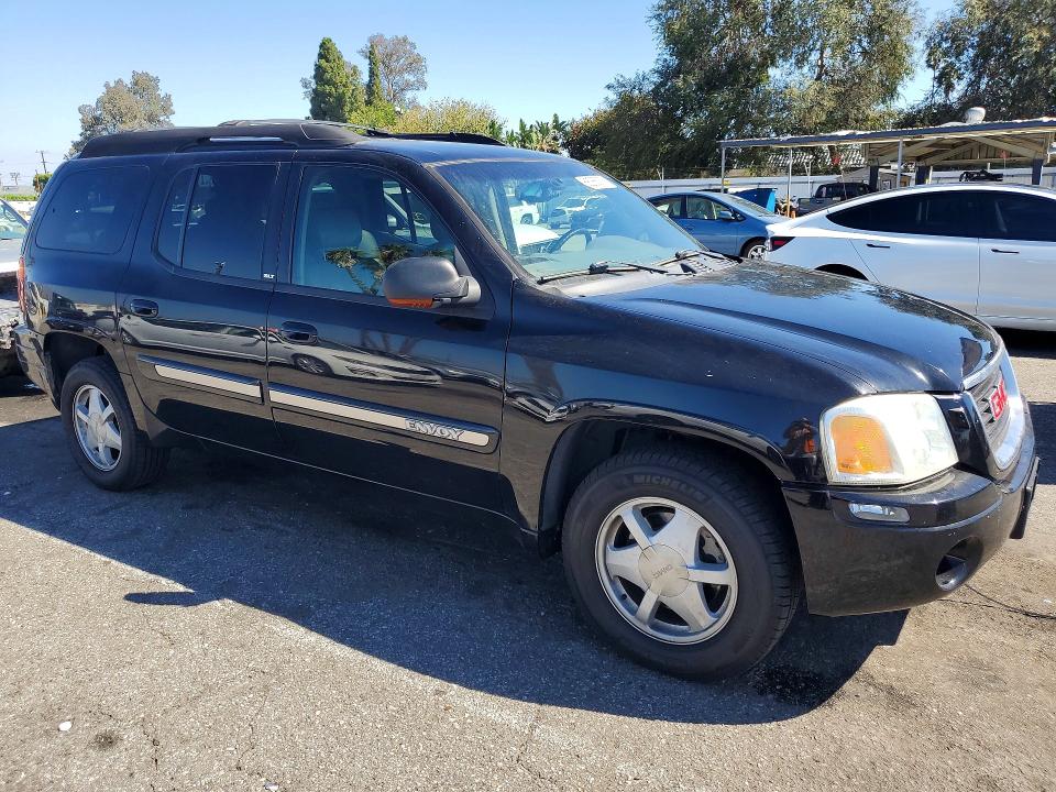 Photo 4 from auction – 2002 GMC ENVOY with VIN 1GKES16S326112519