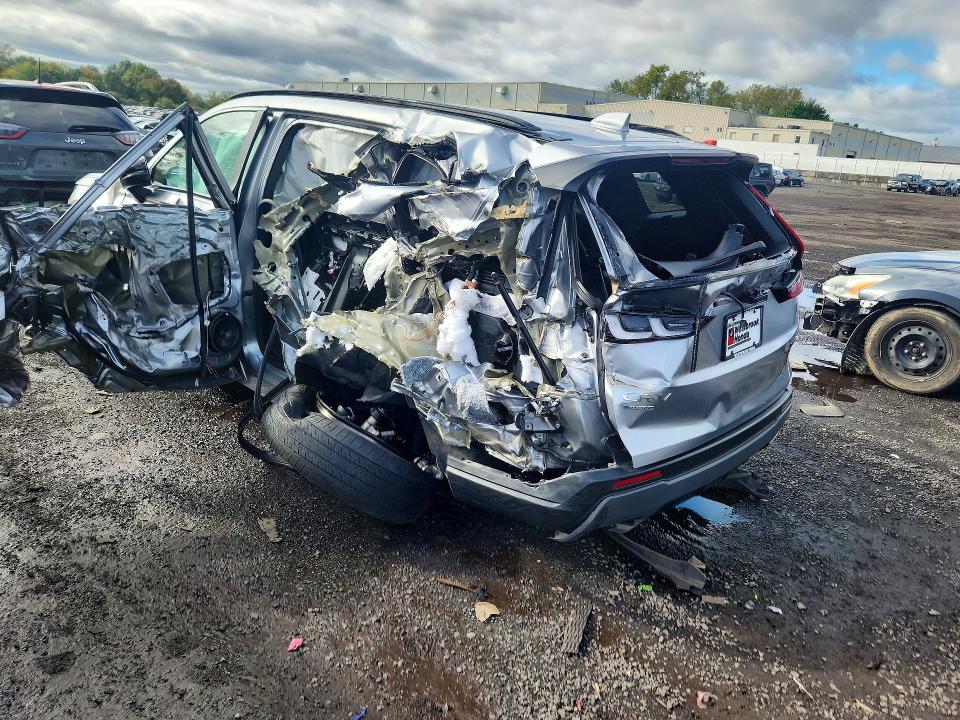 Photo 2 from auction – 2024 HONDA CR-V with VIN 5J6RS6H59RL015753