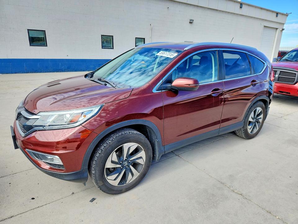Photo 1 from auction – 2015 HONDA CR-V with VIN 5J6RM4H92FL016756