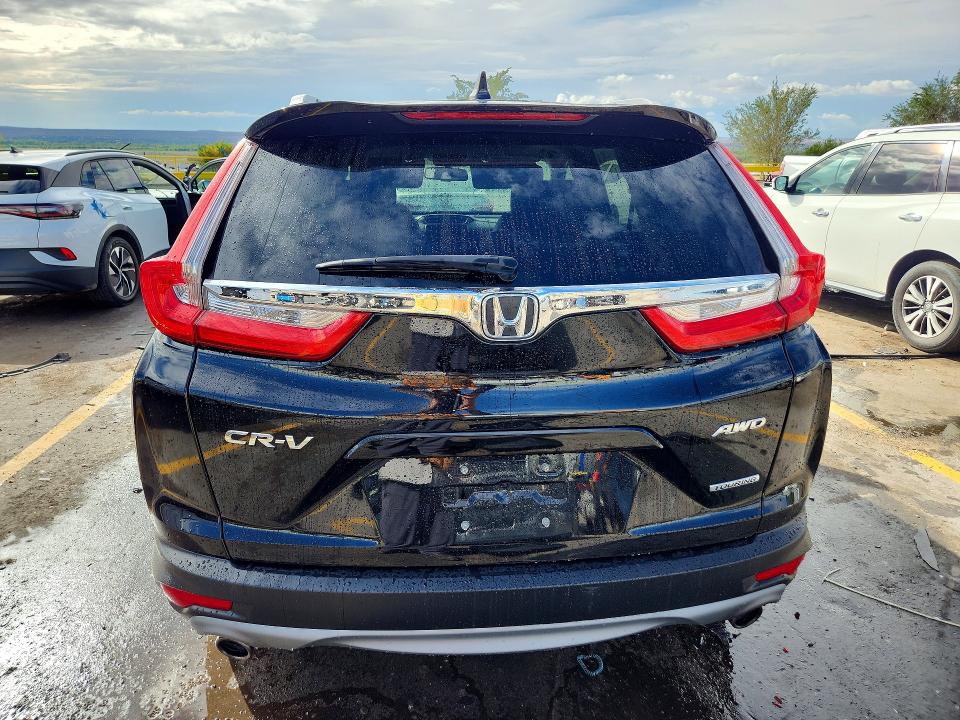 Photo 6 from auction – 2018 HONDA CR-V with VIN 7FARW2H98JE067974