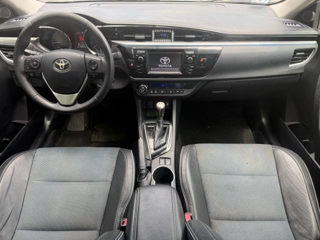 Photo 9 from auction – 2014 TOYOTA COROLLA with VIN 2T1BURHE3EC027496
