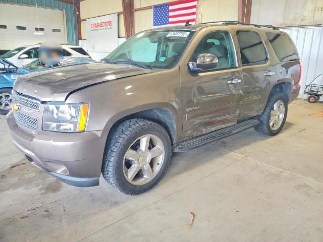 CHEVROLET TAHOE 2014 with VIN 1GNSKAE03ER244110 - Photo from auction