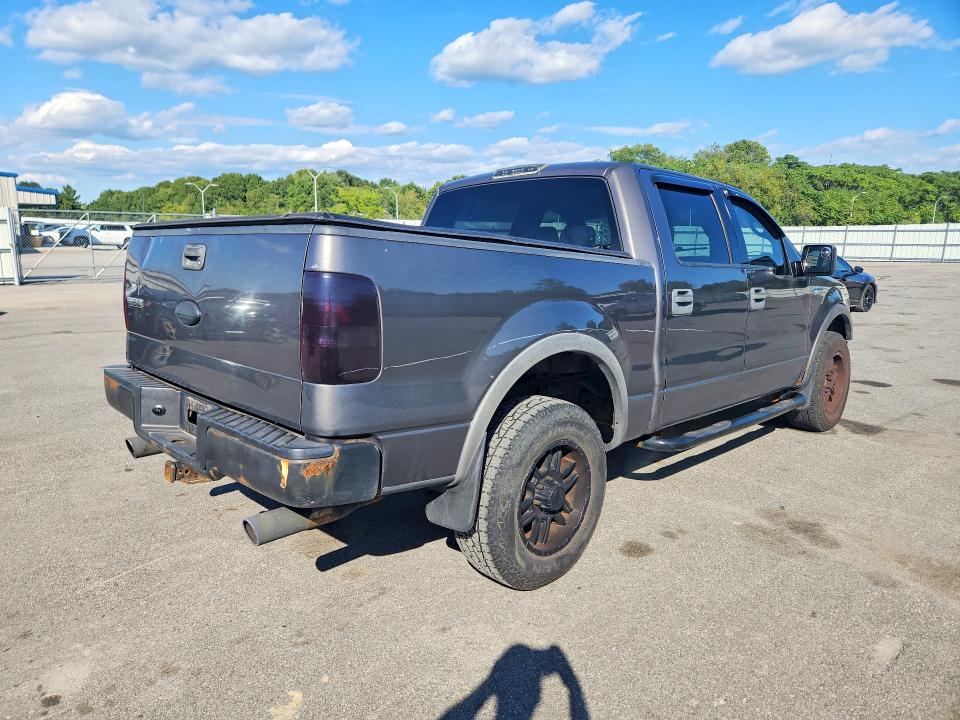 Photo 3 from auction – 2004 FORD F150 with VIN 1FTPW14564KC56341