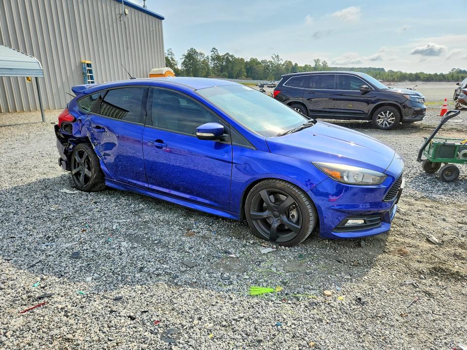 Foto 4 de la subasta – 2015 FORD FOCUS con VIN 1FADP3L91FL246397