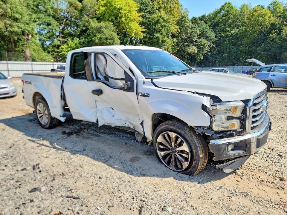 Снимка 4 от търг – 2015 FORD F150 с VIN 1FTEX1EP0FFC25649