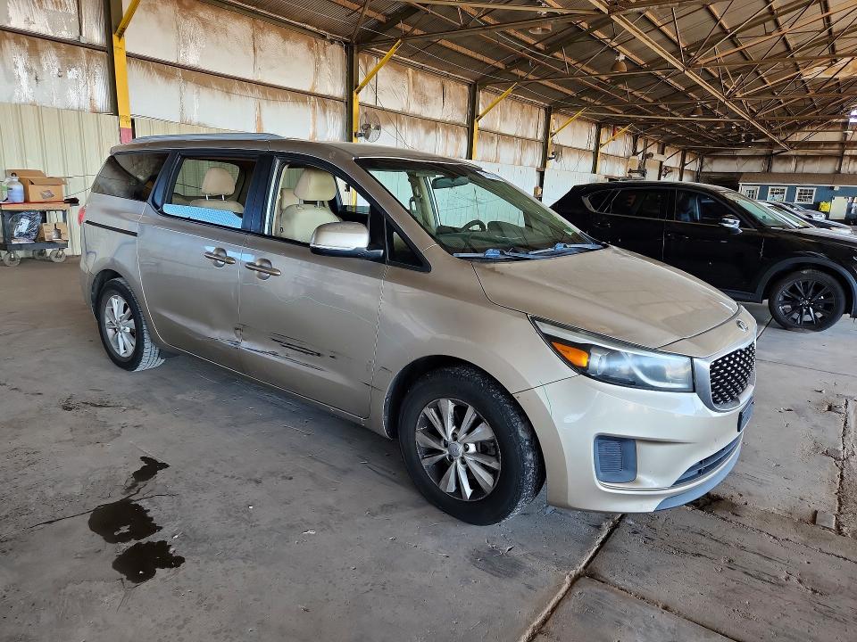 Photo 4 from auction – 2015 KIA SEDONA with VIN KNDMB5C10F6045670