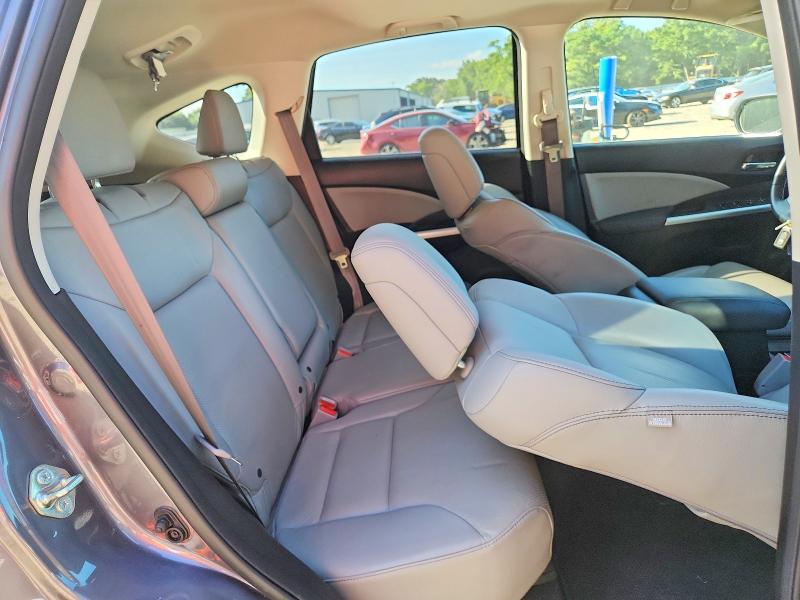 Photo 11 from auction – 2016 HONDA CR-V with VIN 5J6RM3H93GL000724