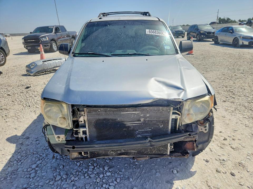 Photo 5 from auction – 2009 FORD ESCAPE with VIN 1FMCU03G39KD11896