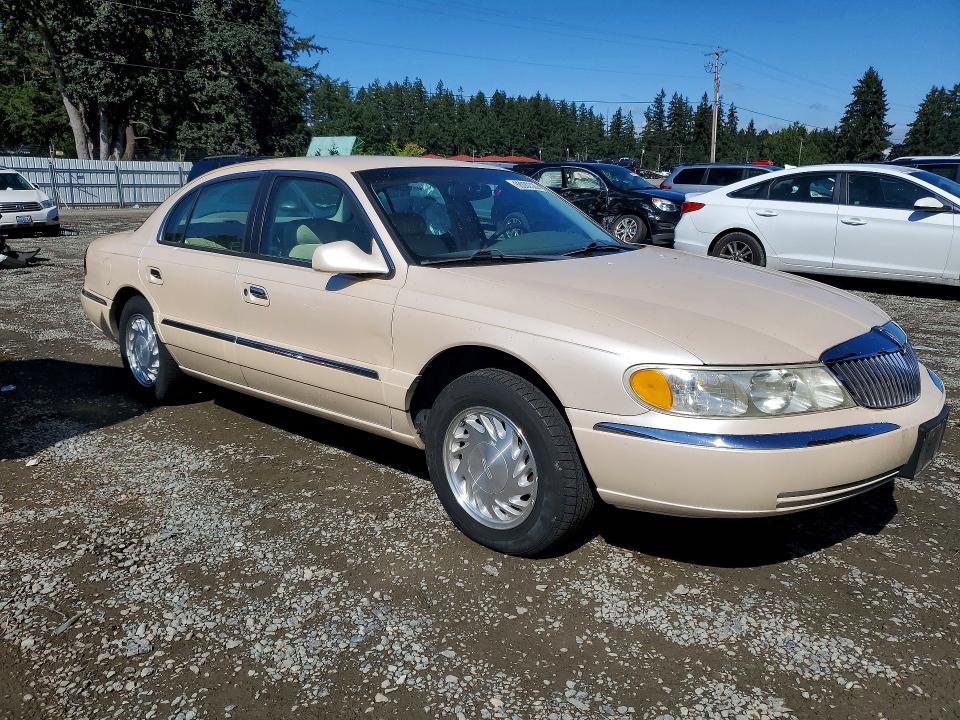 Photo 4 from auction – 1998 LINCOLN CONTINENTAL with VIN 1LNFM97VXWY668172