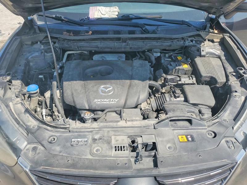 Photo 11 from auction – 2016 MAZDA CX-5 with VIN JM3KE2CYXG0620122
