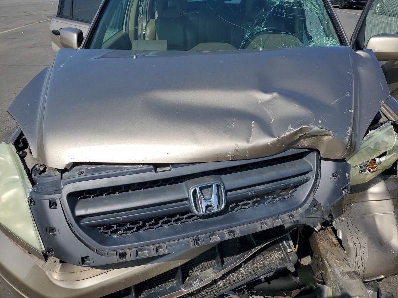 Photo 12 from auction – 2005 HONDA PILOT with VIN 5FNYF18545B034300