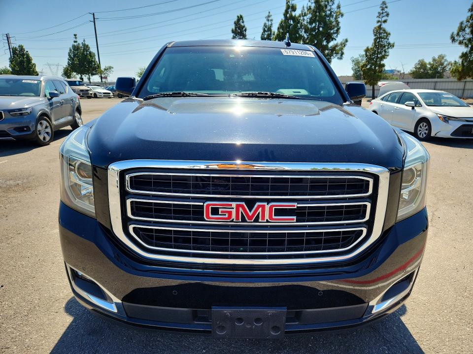 Photo 5 from auction – 2019 GMC YUKON with VIN 1GKS1DKCXKR405774