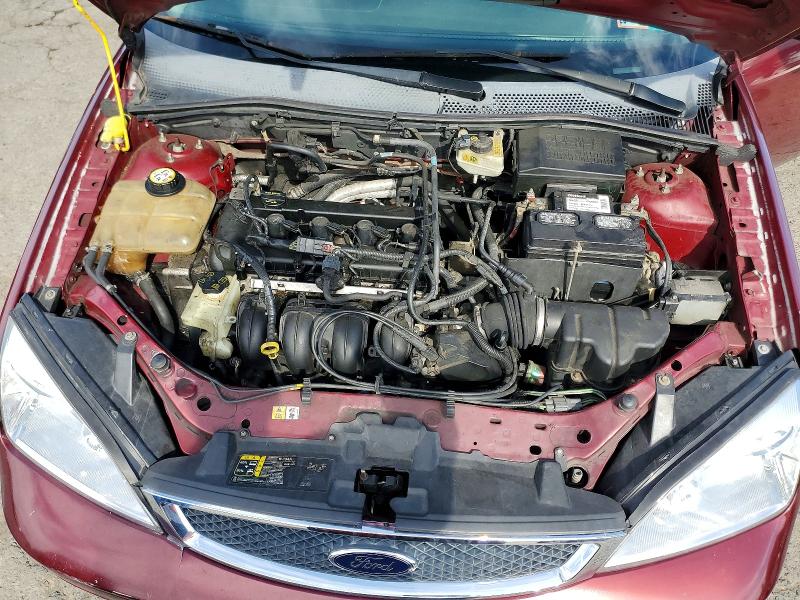 Photo 11 from auction – 2007 FORD FOCUS with VIN 1FAFP31N87W143342