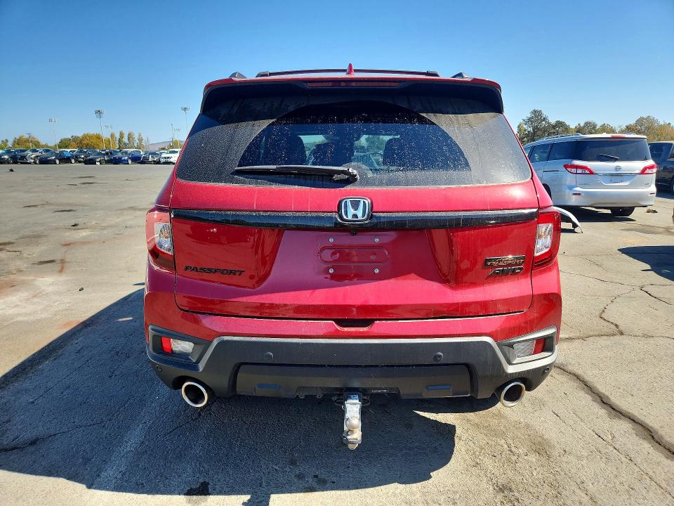 Photo 6 from auction – 2024 HONDA PASSPORT with VIN 5FNYF8H68RB009584