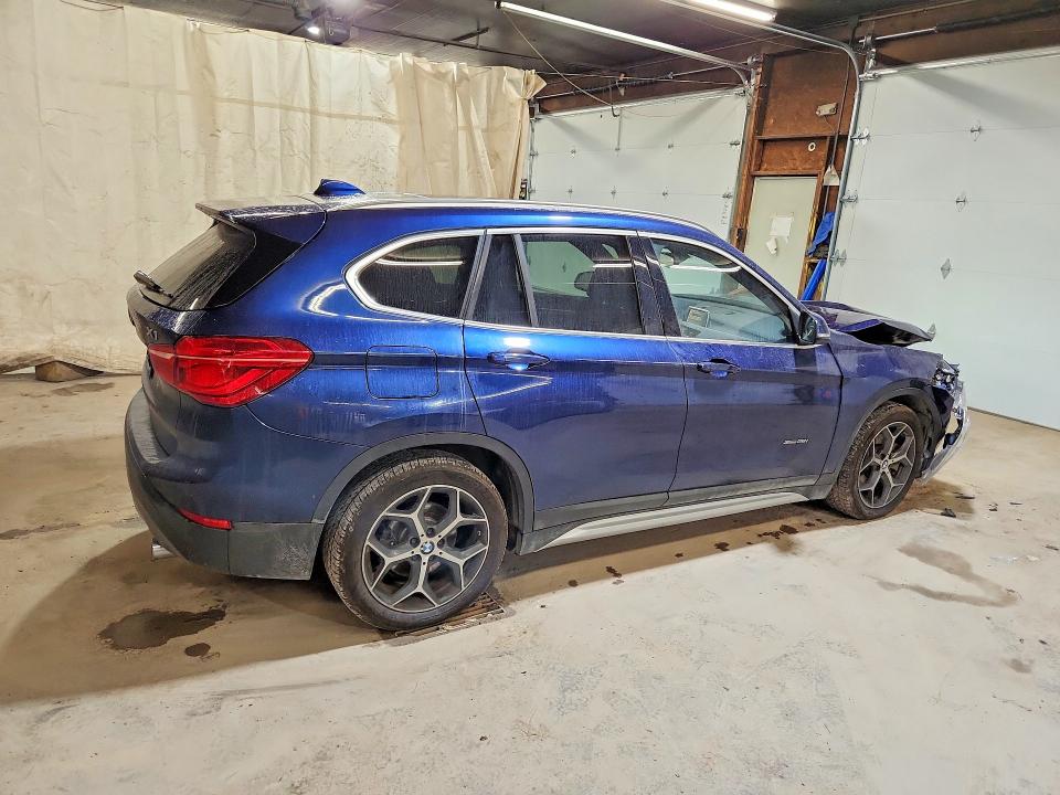 Photo 3 from auction – 2016 BMW X1 with VIN WBXHT3C32GP883105