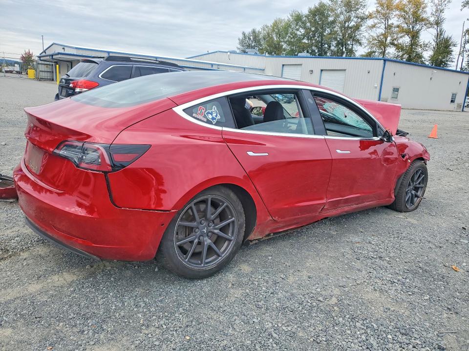 Снимка 3 от търг – 2018 TESLA MODEL 3 с VIN 5YJ3E1EB4JF104640