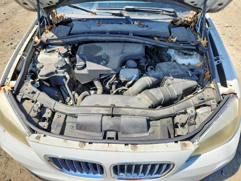 Photo 12 from auction – 2014 BMW X1 with VIN WBAVM1C52EVW51967