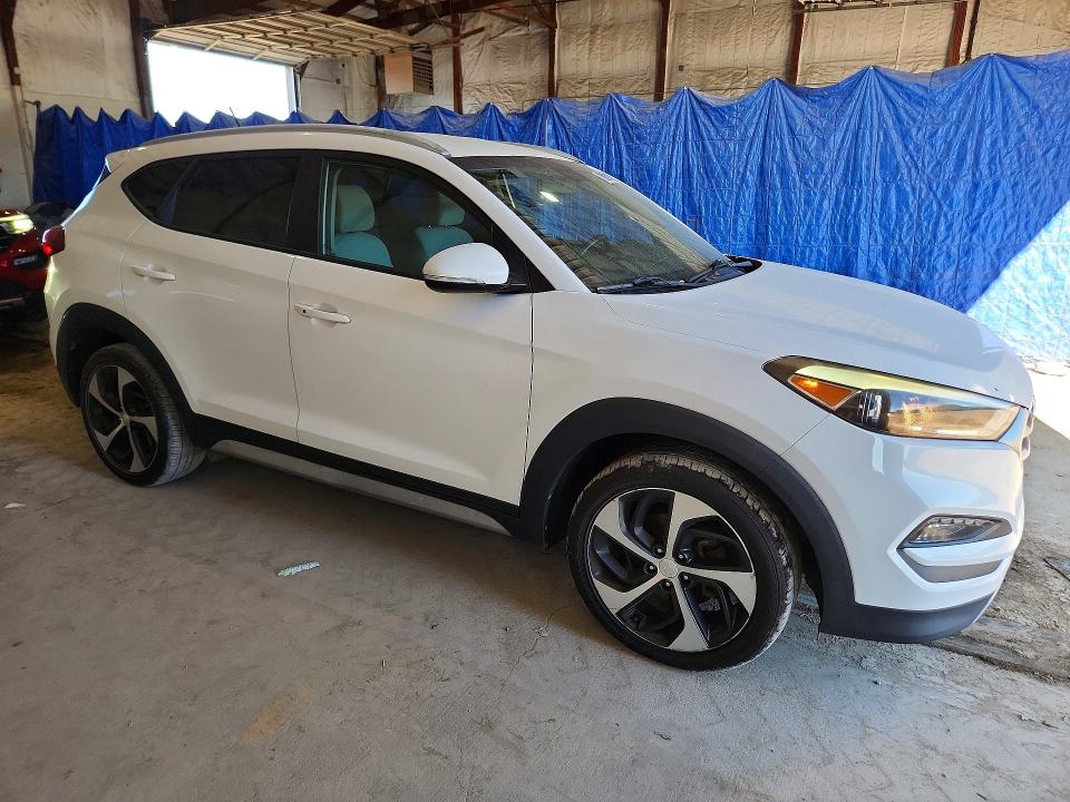 Снимка 4 от търг – 2017 HYUNDAI TUCSON с VIN KM8J3CA25HU400827