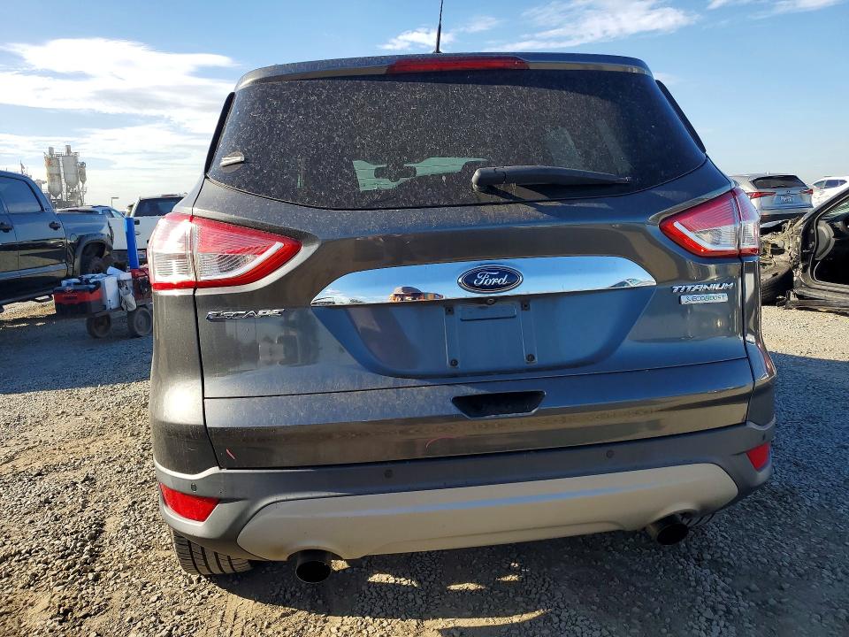 Photo 6 from auction – 2015 FORD ESCAPE with VIN 1FMCU0J96FUC12896