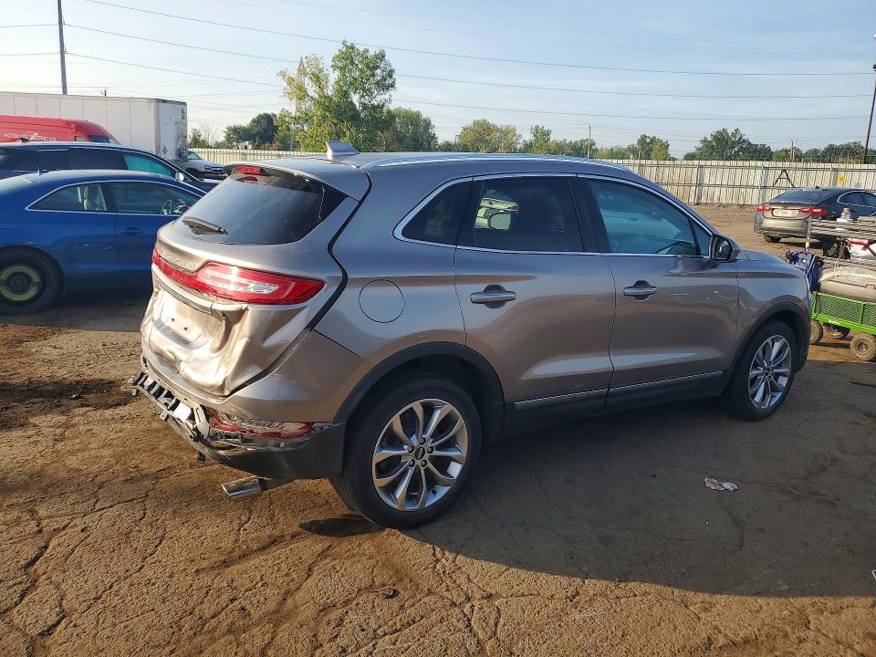 Снимка 3 от търг – 2019 LINCOLN MKC с VIN 5LMCJ2C97KUL09890