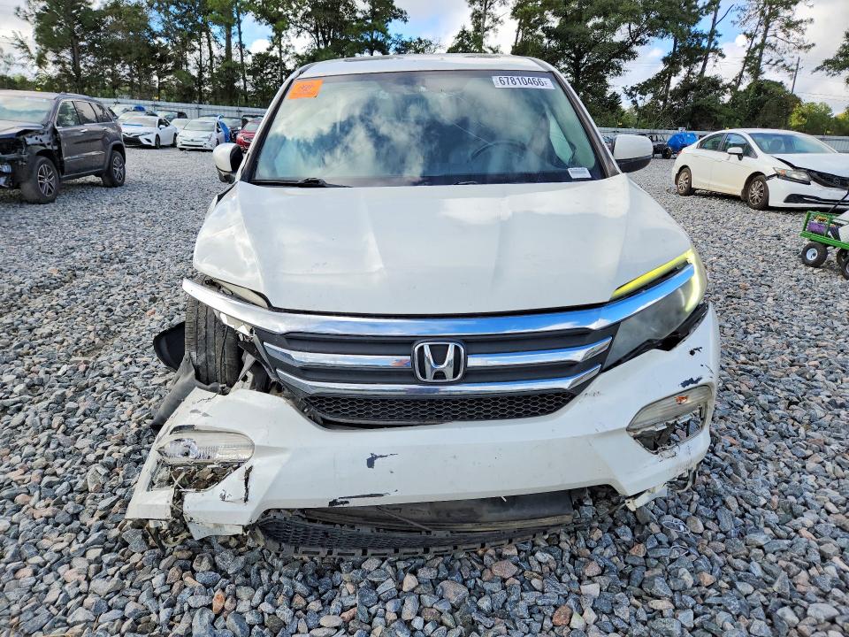 Снимка 5 от търг – 2016 HONDA PILOT с VIN 5FNYF5H56GB048046