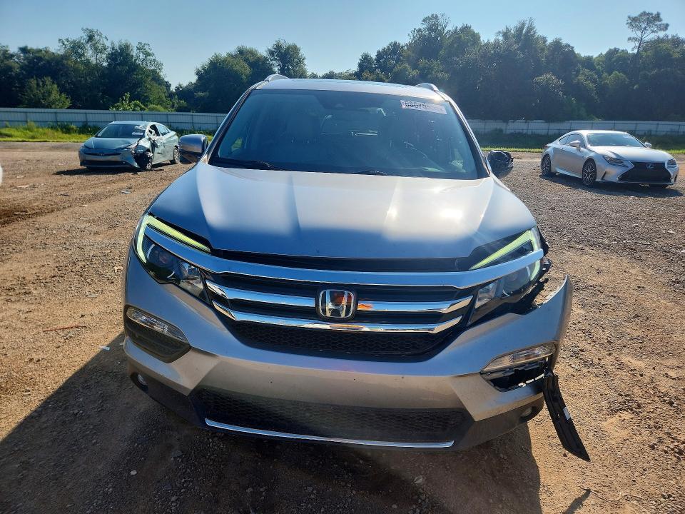 Photo 5 from auction – 2017 HONDA PILOT with VIN 5FNYF5H93HB001190