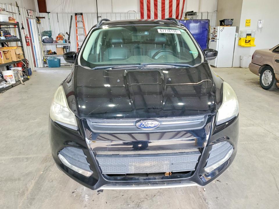 Photo 5 from auction – 2016 FORD ESCAPE with VIN 1FMCU0GX8GUA28891