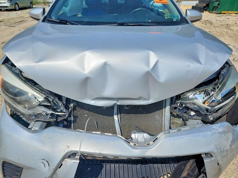 Photo 11 from auction – 2016 TOYOTA COROLLA with VIN 2T1BURHE6GC687258