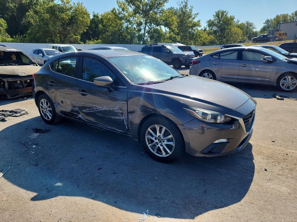 Photo 4 from auction – 2014 MAZDA 3 with VIN JM1BM1M74E1105989