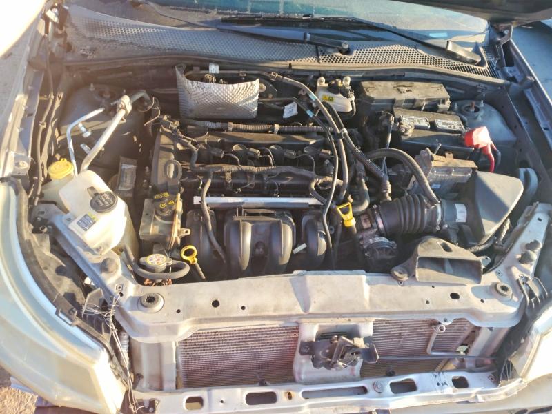 Снимка 11 от търг – 2009 FORD FOCUS с VIN 1FAHP37N49W185235