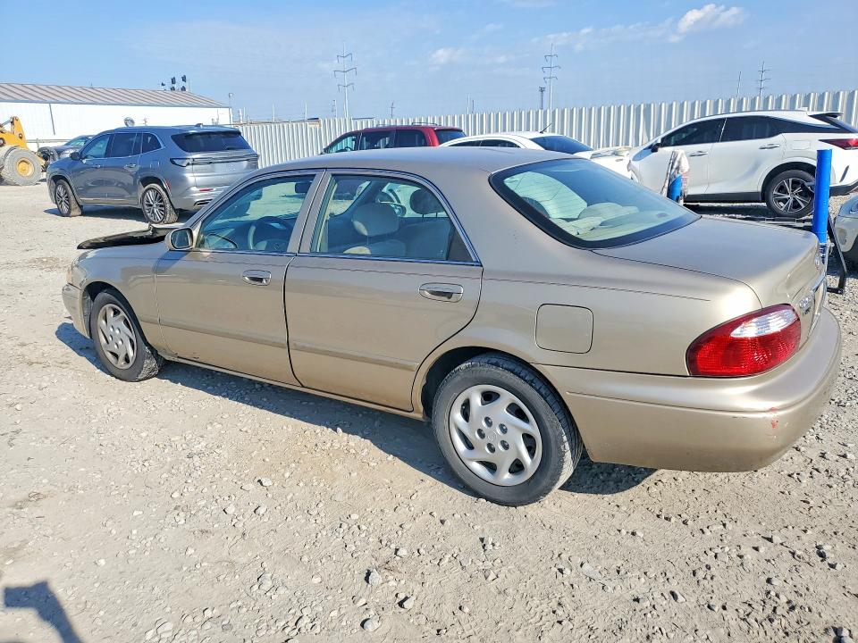 Photo 2 from auction – 2001 MAZDA 626 with VIN 1YVGF22C115221962